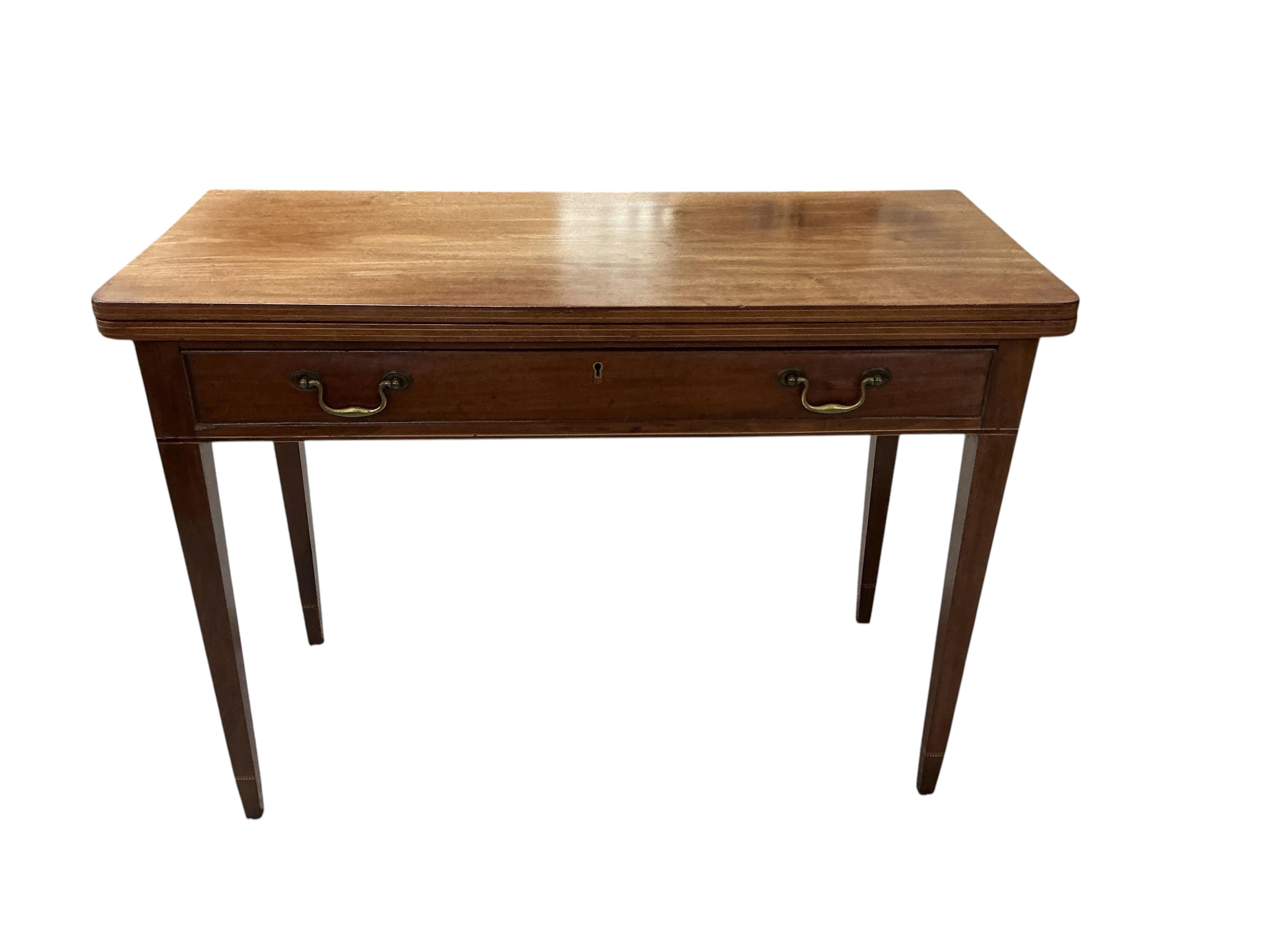 A George III rectangular mahogany folding tea table, width 101cm, depth 43cm, height 72cm